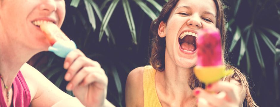 Women enjoying healthy summer snacks