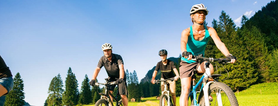 Family cycling safely together