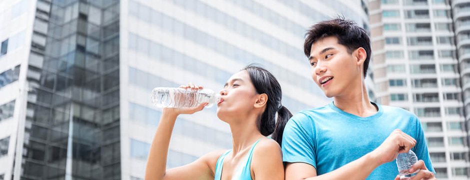 Couple exercising in the heat