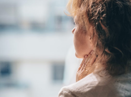 A person staring off into the distance.