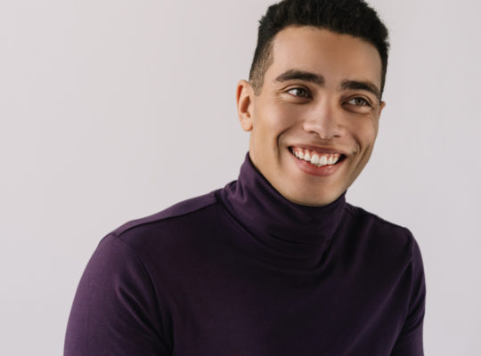 Person looking into distance and smiling