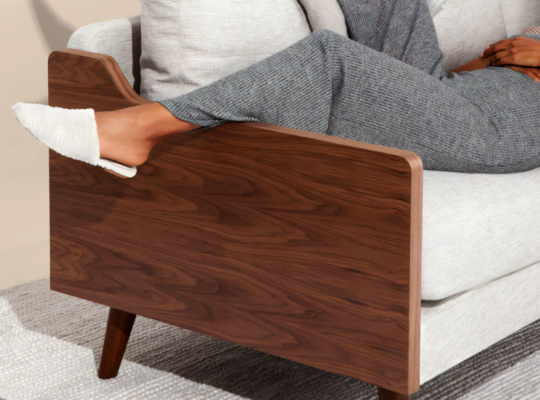 A person lying down on a couch