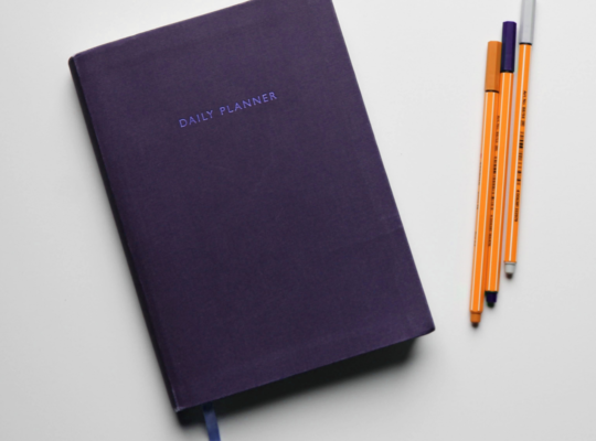 A journal and pencils